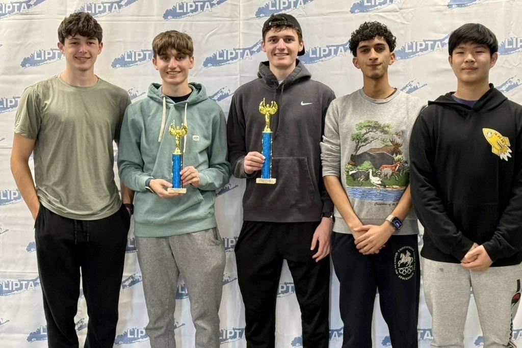  students with trophy